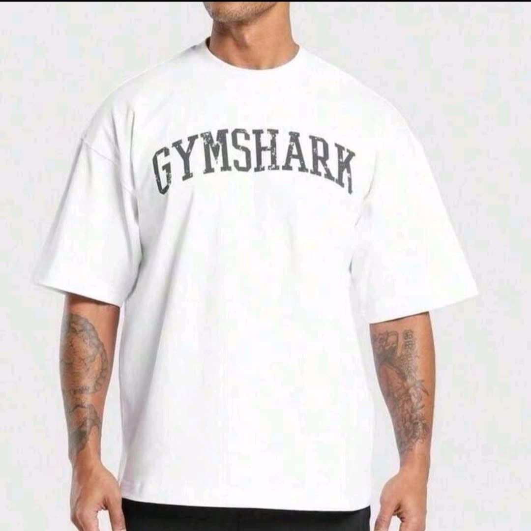 Pullover blanco oversized con estampado frontal GYMSHARK